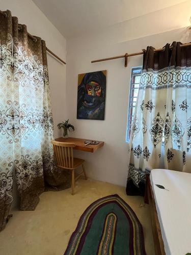 Letto o letti in una camera di mzuri kaja boutique