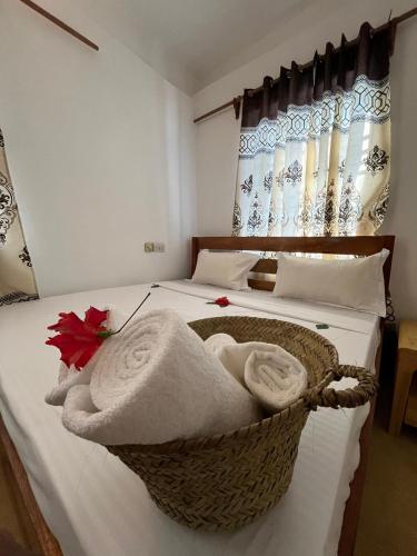 Letto o letti in una camera di mzuri kaja boutique