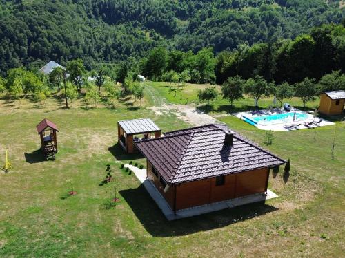 an overhead view of a house and a swimming pool at Turizam Koturovic in Ivanjica