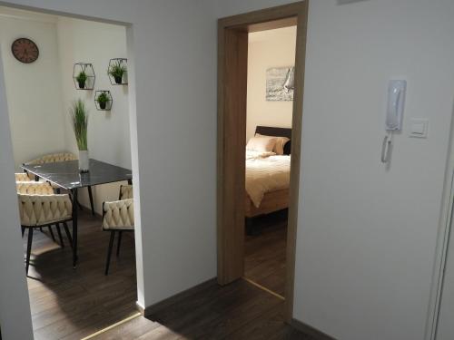 Postel nebo postele na pokoji v ubytování ONYX Apartments