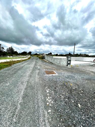 an empty road on a cloudy day at The Ocean Nest 