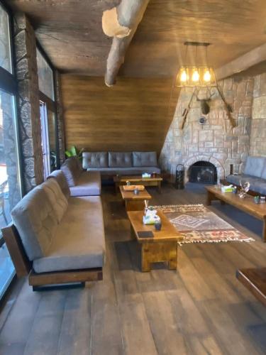 Posezení v ubytování منتجع كفريا السياحي-عجلون Kufraya Resort-Ajloun