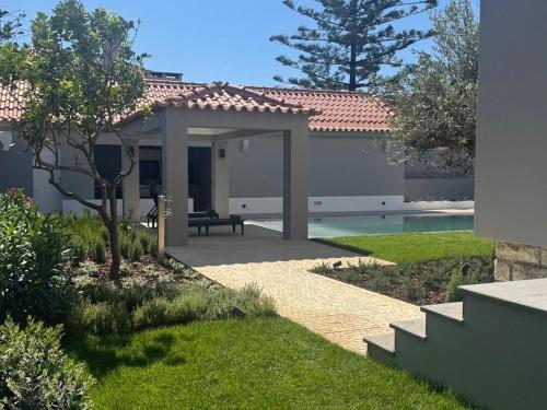 Casa com jardim perto da praia