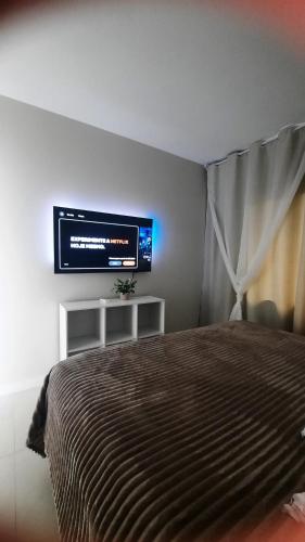 Ein Bett oder Betten in einem Zimmer der Unterkunft Apartamento de dois quartos centro de Pomerode