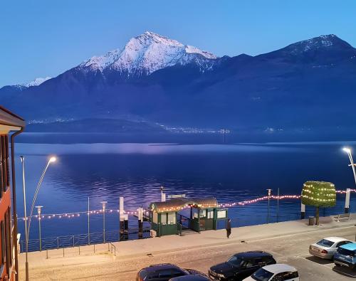a view of a mountain over a body of water at Spacious Historic Apartment F1 in Gravedona