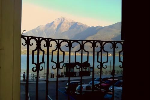 a view of a mountain from a balcony at Spacious Historic Apartment F1 in Gravedona