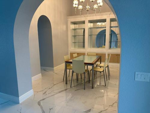 a dining room with a table and chairs at Gulf Cove Community in Port Charlotte