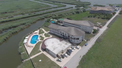 an overhead view of a large building with a pool at Rio Divino in Murighiol