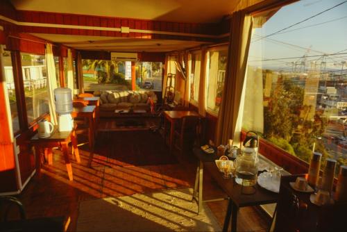 a room with a view of a living room at Hotel Puerto Mayor in San Antonio