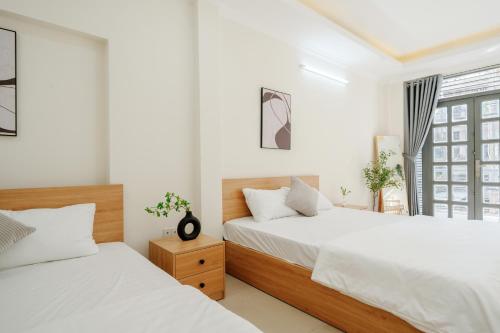 Ein Bett oder Betten in einem Zimmer der Unterkunft Elysian Home 2 - Centre District 1