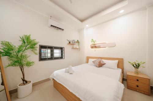 Ein Bett oder Betten in einem Zimmer der Unterkunft Elysian Home 2 - Centre District 1
