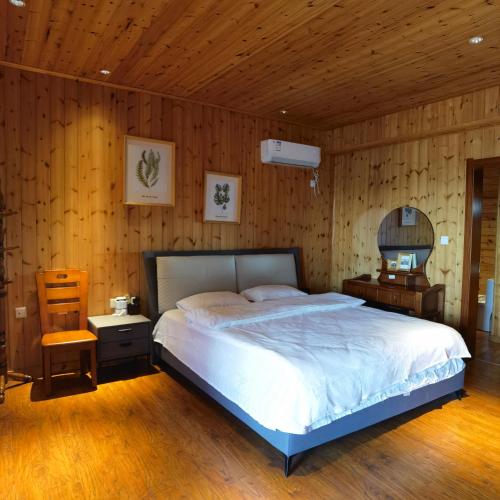 ZhangJiaJie AvaSprings Retreatにあるベッド