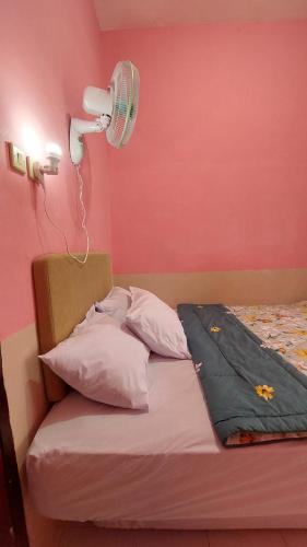 Postel nebo postele na pokoji v ubytování otw homestay