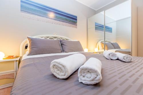 Katil atau katil-katil dalam bilik di Ava Apartments