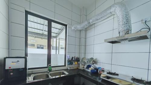 Η κουζίνα ή μικρή κουζίνα στο My Residence, Bintulu