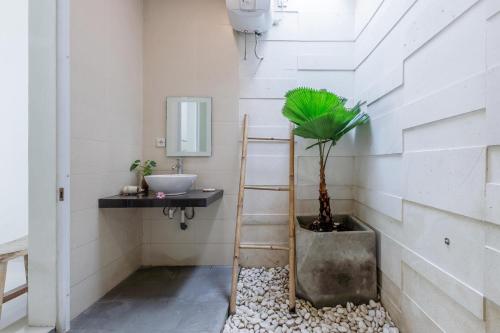 Phòng tắm tại Bale Village Villa By Kasta Hospitality