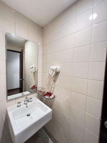 Ένα μπάνιο στο Alltrue Lite Hotel Nagoya Hill Batam
