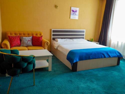 Кровать или кровати в номере Castella Hotel Ulaanbaatar