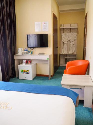 Телевизор и/или развлекательный центр в Castella Hotel Ulaanbaatar