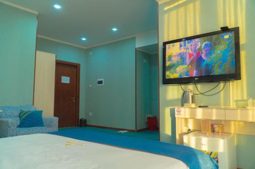 Телевизор и/или развлекательный центр в Castella Hotel Ulaanbaatar