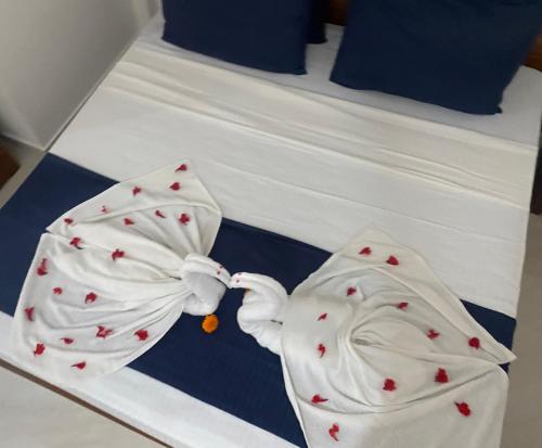 Postel nebo postele na pokoji v ubytování Sandaru villa