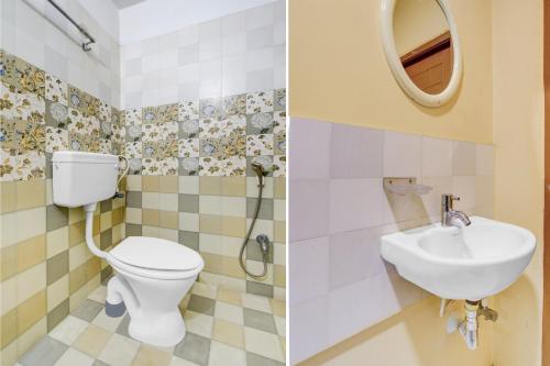 a bathroom with a toilet and a sink at Super Collection O Victoria Memorial Metro Station Formerly Shanthaa Residency in Surūrnagar