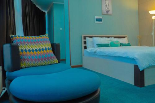 Кровать или кровати в номере Castella Hotel Ulaanbaatar