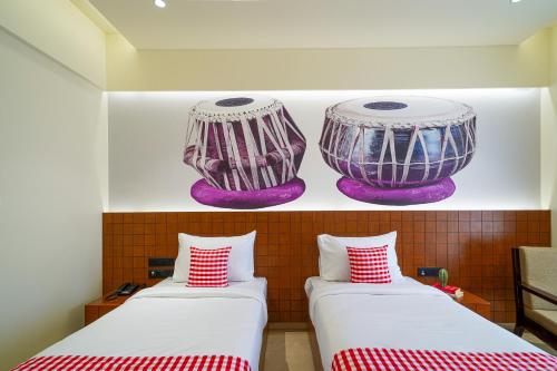 Cama o camas de una habitación en Open Hotel by Olive - Tulips Inn and Suites