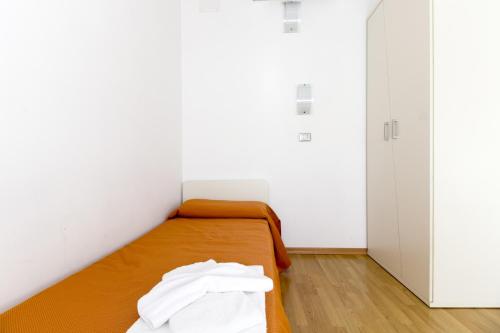 Postel nebo postele na pokoji v ubytování Hotel Sharing