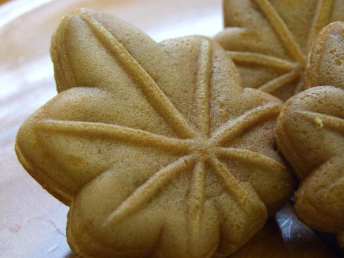 a group of gingerbread cookies sitting on a plate at EN HOTEL Hiroshima in Hiroshima