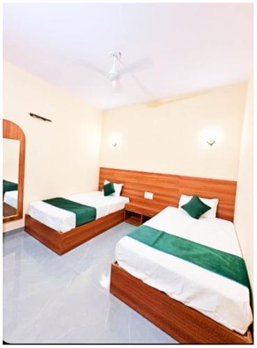 Hotel Jay ambey palace In Jaipurにあるベッド