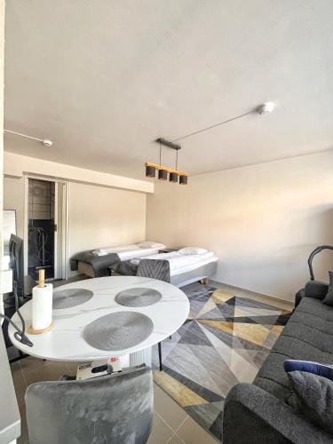 Гостиная зона в Kotimaailma Aparthotel Ankkuri - Two bedroom