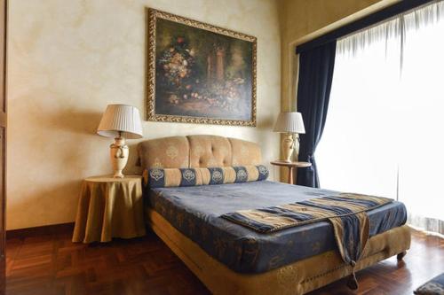 Postel nebo postele na pokoji v ubytování Parione Suite Piazza Navona
