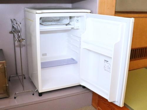 Kuchyň nebo kuchyňský kout v ubytování Hotel Ichii