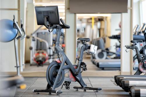 a gym with several exercise bikes in a row at Hyatt Centric Center City Philadelphia in Philadelphia