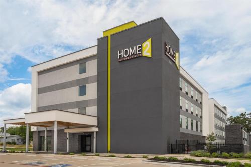 a building with a home depot sign on it at Home2 Suites By Hilton Austin South in Austin