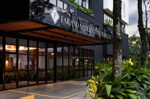 a building with a sign for a restaurant at Faranda Collection Medellin, a Member of Radisson Individuals in Medellín