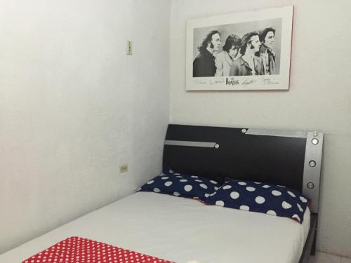 Un ou plusieurs lits dans un hébergement de l'établissement Hostel Mamy Dorme