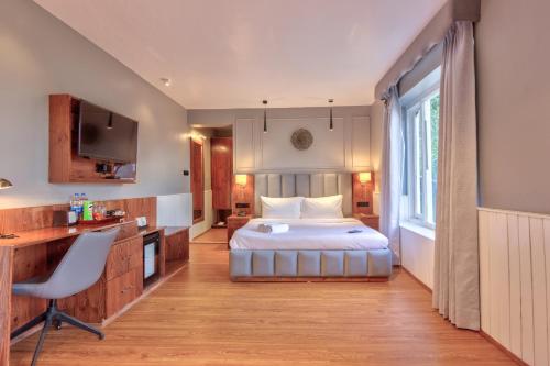 Ein Bett oder Betten in einem Zimmer der Unterkunft Ekaanth