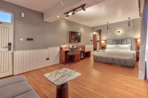 Ein Bett oder Betten in einem Zimmer der Unterkunft Ekaanth