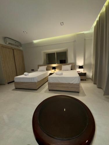 Ένα ή περισσότερα κρεβάτια σε δωμάτιο στο Rivana Apartments