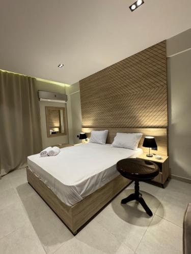 Ένα ή περισσότερα κρεβάτια σε δωμάτιο στο Rivana Apartments