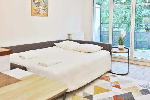 Postel nebo postele na pokoji v ubytování Appartement Neuf - Paris Disneyland