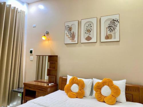 Ένα ή περισσότερα κρεβάτια σε δωμάτιο στο Bee Homestay Phan Thiết