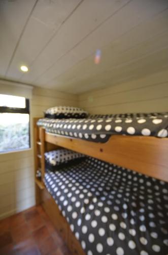 Un ou plusieurs lits dans un hébergement de l'établissement Templeview Lodge