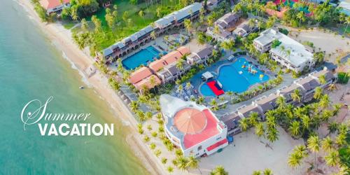 an aerial view of a resort on the beach at Le' VIVA Resort Mui Ne in Mui Ne