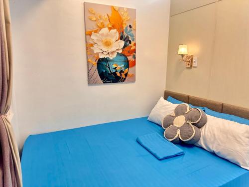 Ένα ή περισσότερα κρεβάτια σε δωμάτιο στο Paradise Staycation at South