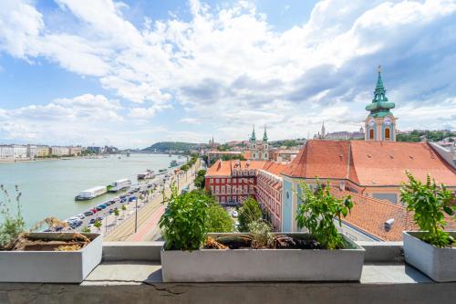 a view of the danube river and a city at Breathtaking Panorama view 3Br Balcony in Budapest