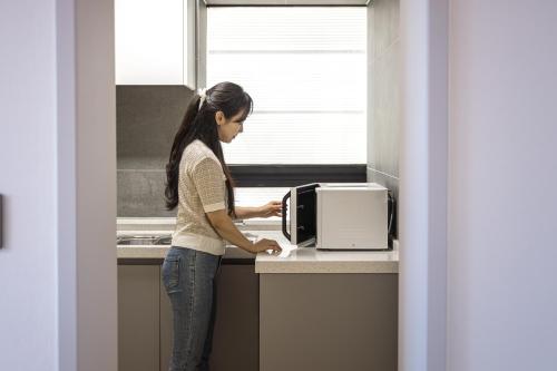 Una cocina o zona de cocina en Hotel Wooin