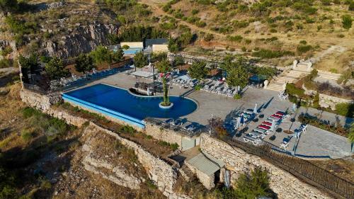 an aerial view of a pool in a parking lot at Villagio Resort in Zaarour in Zaarour